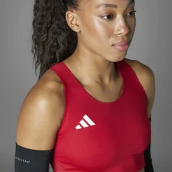 T-Shirts En Tops < adidas Adizero Eentia Hardooptop Dae - tea power red IY5509