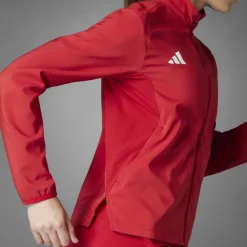Jassen & Vesten < adidas Adizero Eentia Hardoopja Dae - tepo red IT1821