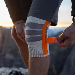 Sportbandages & Braces|Sportbandages & Braces < Bauerfeind Outdoor Kniebandage - andtone-orange