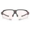 Racefietsbrillen < Rudy Project Deltabeat Bril - Photochromic Lens - Charcoal Matte/ImpactX 2 Red
