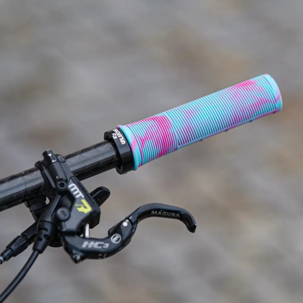 Unleazhed G1 MTB stuurgrepen - Turquoise/Pink