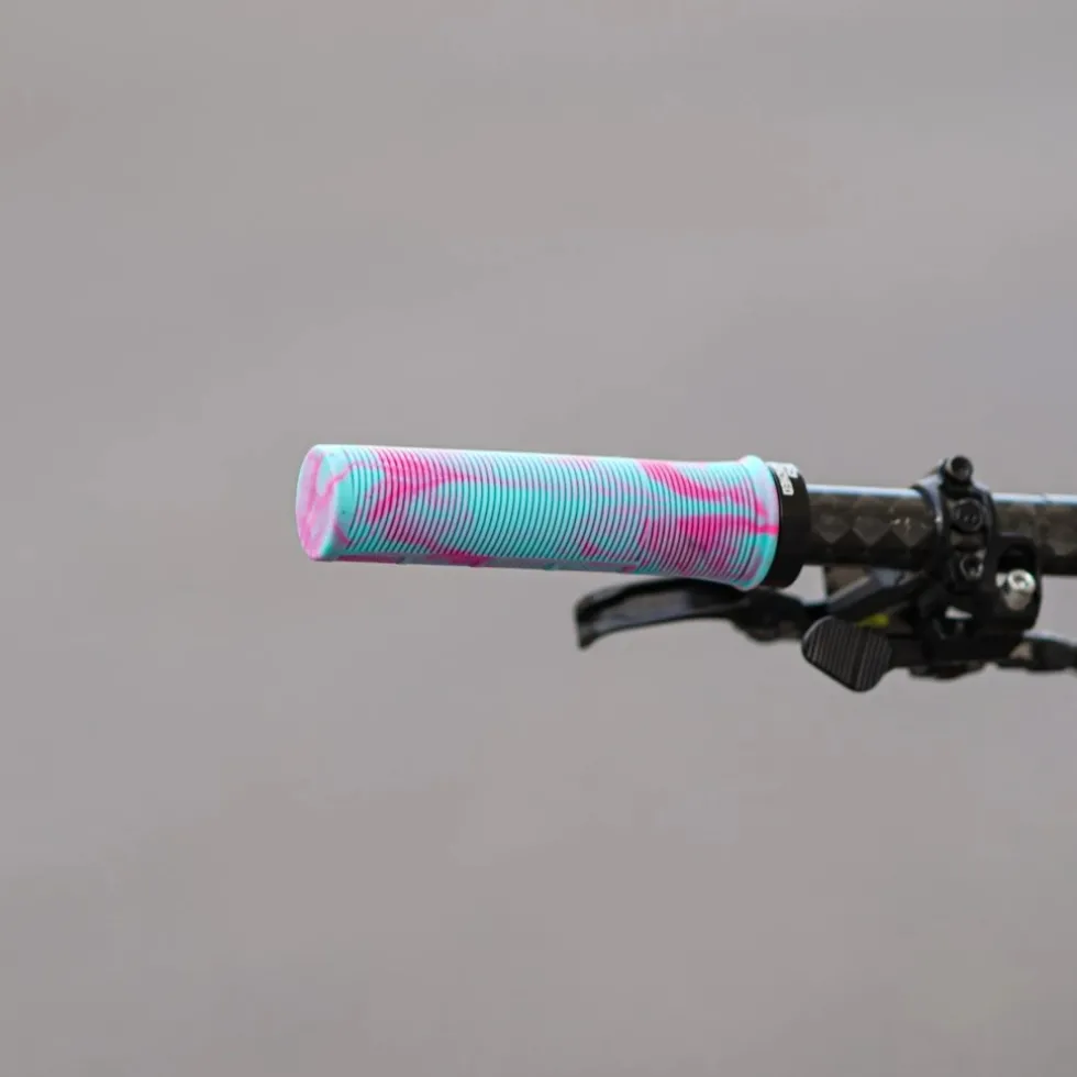 Unleazhed G1 MTB stuurgrepen - Turquoise/Pink